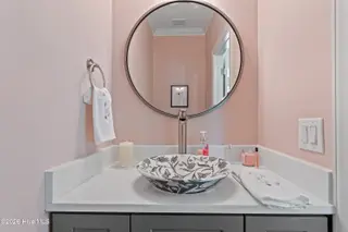 3615 W Medinah Avenue SE, Southport, NC 28461 — 4-bedroom home in St James, Southport, NC, photo 15 of 75: Powder room