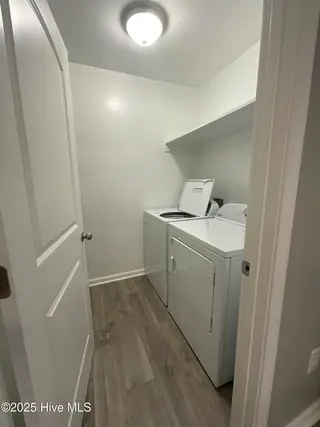 93 Shamrock Drive SW, Sunset Beach, NC 28468 – photo 7: Large Laundry Room