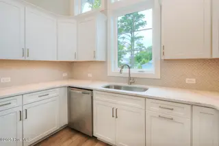 170 NE 31st Street, Oak Island, NC 28465 – photo 12: 170 NE 31st St Oak Island NC-large-017-0