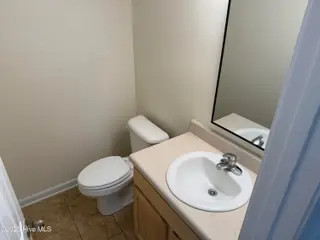 309 Comanche Trail, Havelock, NC 28532 – photo 12: HALF BATH 1ST FLOOR