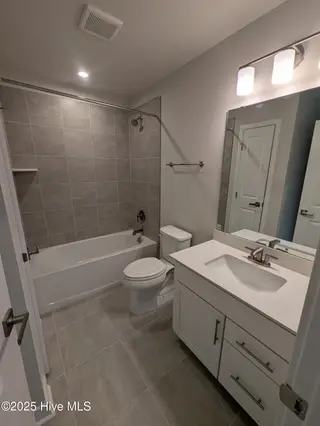 1276 Piper Glen Drive, Sunset Beach, NC 28468 – photo 11: Bathroom