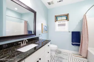 3702 E Dolphin Drive, Oak Island, NC 28465 – photo 20: shniderproductions.com-47