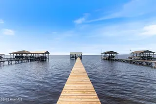 712 Canal Cove Road, Lake Waccamaw, NC 28450 – photo 4: Pier to Covered Boat Slip