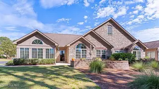 125 W Chelsea Court, Southern Pines, NC 28387 — 3-bedroom condo in Mid South Club, Southern Pines, NC, photo 2 of 45: Exterior