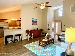 11 Court 11 Northwest Drive NW, Carolina Shores, NC 28467 — 3-bedroom home in Carolina Shores, Carolina Shores, NC, photo 6 of 28: 7-Living Room