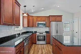 208 NE 52nd Street, Oak Island, NC 28465 – photo 3: 38-web-or-mls-DSC04410