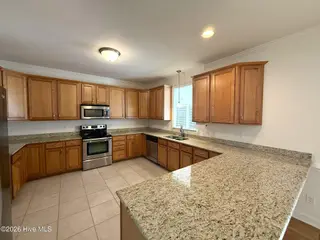 103 Castelnau Court, Jacksonville, NC 28540 — 5-bedroom home in Williamsburg Plantation, Jacksonville, NC, photo 9 of 52: 7. Kitchen