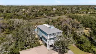 124 W Pelican Drive, Oak Island, NC 28465 – photo 2: 1-web-or-mls-DJI_20250925134957_0847_D