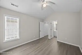 3817 Elizabeth Avenue, New Bern, NC 28562 – photo 3: Primary Bedroom with Vaulted Ceiling