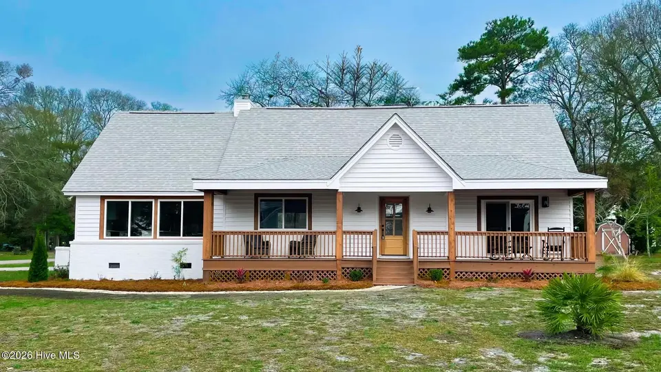 501 Shoreline Drive E, Sunset Beach, NC 28468 – photo 1 of 39: coverupdated
