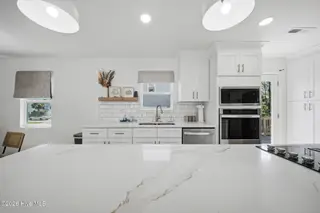 313 Greenville Avenue, Carolina Beach, NC 28428 – photo 14: 15-web-or-mls-GI - 313 Greenville Ave -