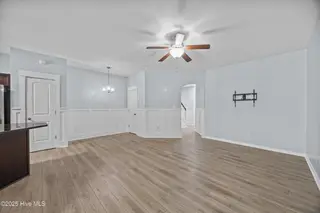 323 Cedar Island Trail, Holly Ridge, NC 28445 — 3-bedroom townhome in The Landing At Folkstone, Holly Ridge, NC, photo 9 of 36: 13_living room