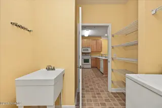 250 Woodlands Way Unit 14, Calabash, NC 28467 — 3-bedroom condo in Woodlands @ Crow Creek, Calabash, NC, photo 10 of 49: Laundry