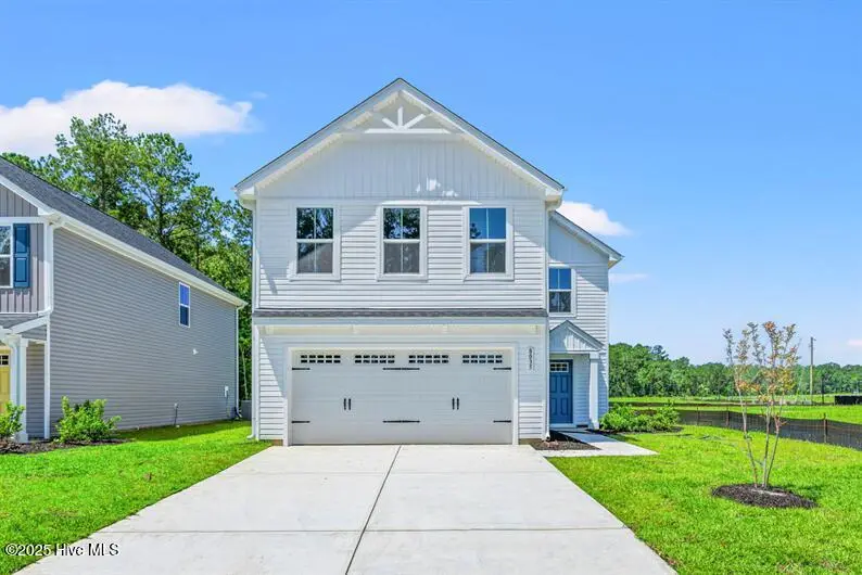 8035 Sterling Oak Drive NW, Ash, NC 28420 – photo 1 of 18: Front