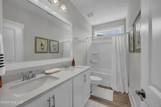 7879 Harrier Circle, Leland, NC 28451 – photo 16: Guest Bath w/Double Vanities