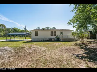 6883 Eastbrook Avenue SW, Ocean Isle Beach, NC 28469 — 2-bedroom manufactured home in Pine Acres, Ocean Isle Beach, NC, photo 10 of 25: mls-DSC00940