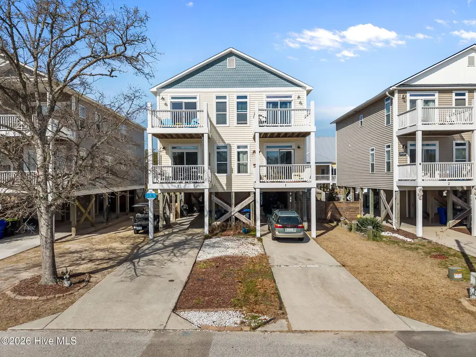 1612 Searay Lane Unit 2, Carolina Beach, NC 28428 – photo 1 of 48: 2-web-or-mls-DJI_20260304101642_0870_D