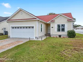5009 N Hampton Drive SE, Southport, NC 28461 – photo 1: 5009 N Hampton Dr SE, Southport