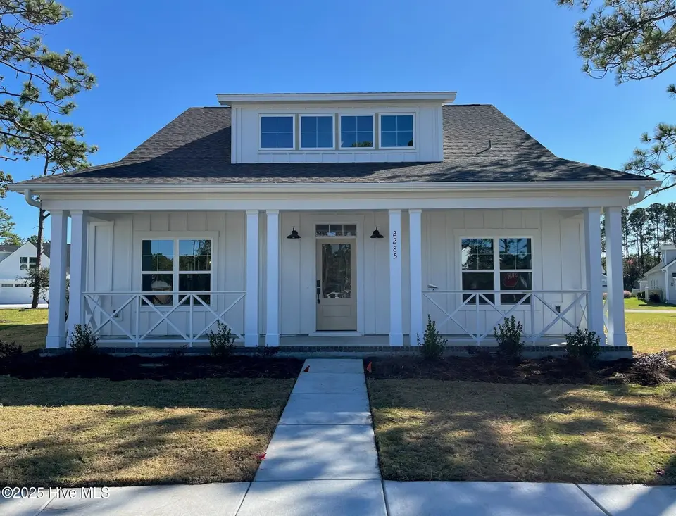 2285 Crescent Bay Drive, Southport, NC 28461 – photo 1 of 26: Front of Home
