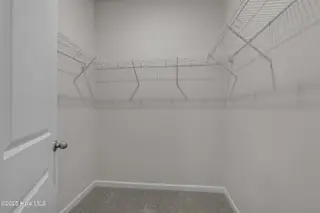 313 Parkington Lane 86a, Ocean Isle Beach, NC 28469 – photo 22: primary bedroom closet