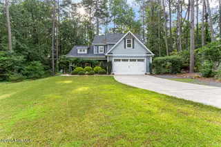 60 Lakeview Drive, Whispering Pines, NC 28327 – photo 1: 60 Lakeview Dr-LR-JFP-2