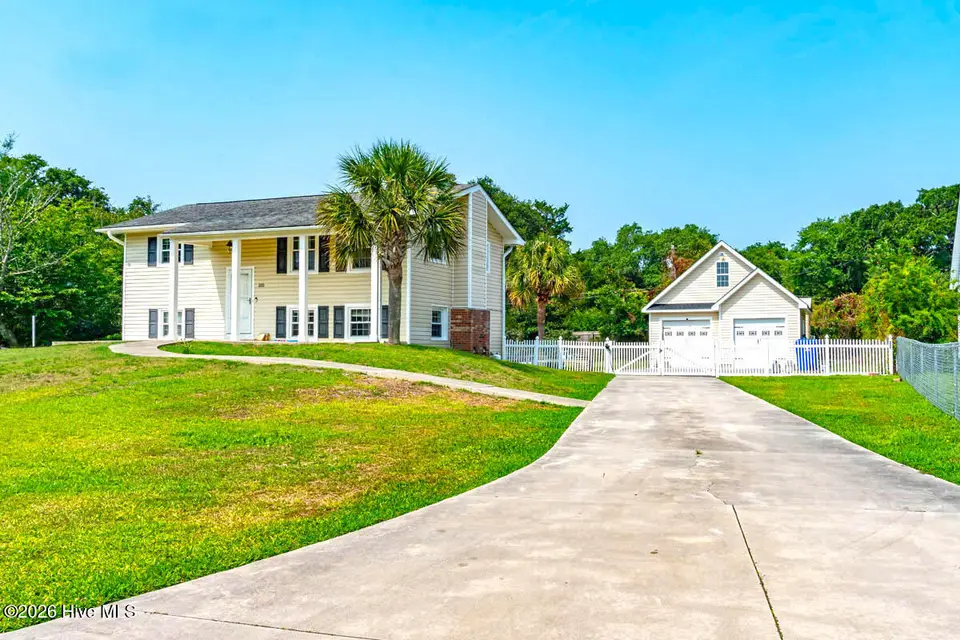 310 Holly Lane, Cape Carteret, NC 28584 – photo 1 of 73: 310 Holly Lane front elevation