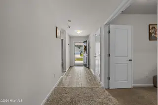 737 Landmark Cove, Carolina Shores, NC 28467 — 4-bedroom home in Landmark at Lighthouse Cove, Carolina Shores, NC, photo 5 of 39: Hallway