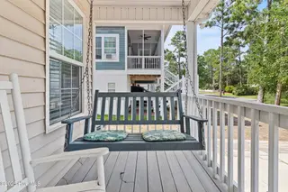 316 NE 52nd Street, Oak Island, NC 28465 – photo 15: 10_front porch