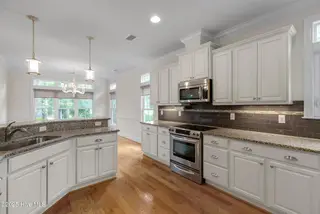 402 Cornubia Drive, Castle Hayne, NC 28429 – photo 17: Cornubia402-6kitShaneL33A4725-CR2