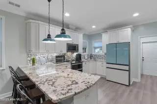301 NE 51st Street, Oak Island, NC 28465 – photo 17: 301NE51stSt - 26
