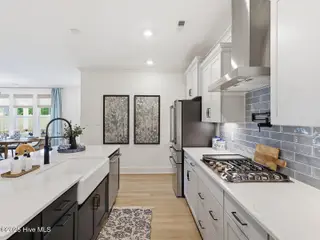9251 Salty Breeze Place, Leland, NC 28451 — 5-bedroom home in Grand Park, Leland, NC, photo 16 of 42: Kitchen