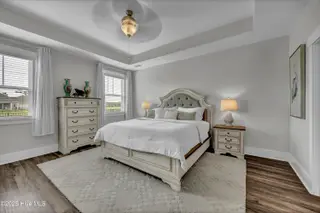 7879 Harrier Circle, Leland, NC 28451 – photo 22: Primary Suite w/Box Ceiling