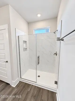 8615 Blue Haw Way Lot 125, Leland, NC 28451 — 3-bedroom home in Indigo Preserve, Leland, NC, photo 16 of 41: Primary Shower