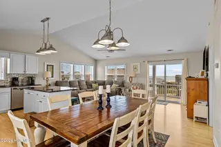 1907 Emerald Drive, Emerald Isle, NC 28594 – photo 23: Dining - Living - Kitchen