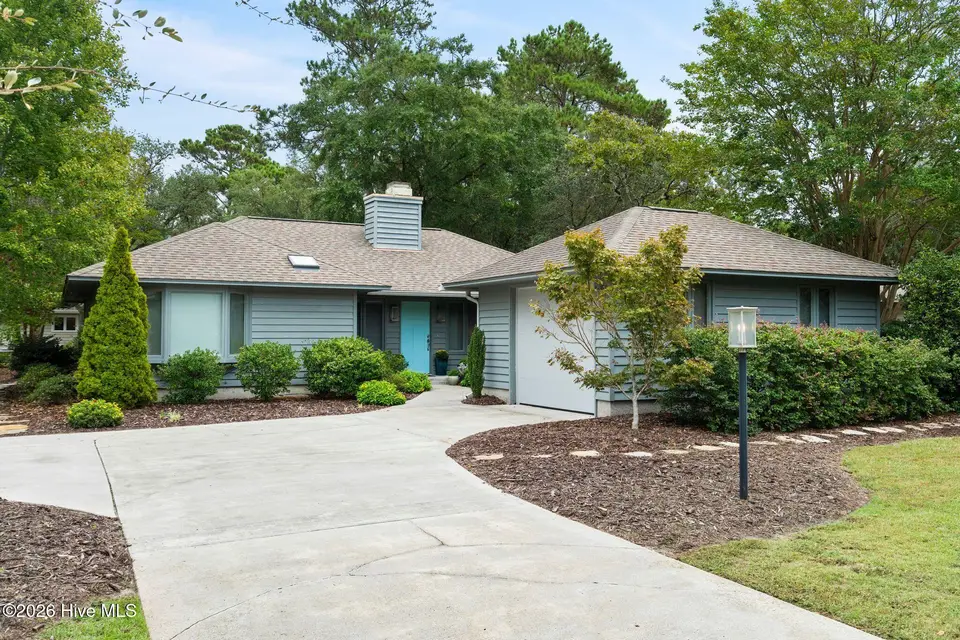 606 Wisteria Drive, Sunset Beach, NC 28468 – photo 1 of 77: 1_DSC09736