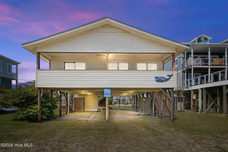 508 W Beach Drive, Oak Island, NC 28465 – photo 1 of 38: Virtual dusk