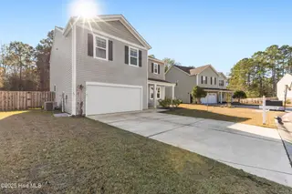 733 Avington Lane NE, Leland, NC 28451 – photo 2: Expansive 2-car Garage