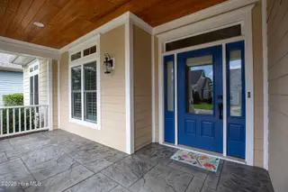 402 Cornubia Drive, Castle Hayne, NC 28429 – photo 2: Cornubia402-2fprchShaneL33A4554 copy - C
