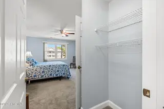 908 Resort Circle Unit 512, Sunset Beach, NC 28468 — 2-bedroom condo in Colony II, Sunset Beach, NC, photo 20 of 39: Primary Bedroom