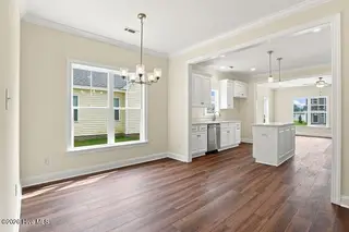 3209 Dolostone Court SW, Wilson, NC 27893 – photo 17: Dining Area to Kitchen