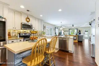 131 NE 33rd Street, Oak Island, NC 28465 – photo 24: kitchen with added storage