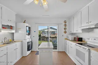 4328 E Dolphin Drive, Oak Island, NC 28465 – photo 15: 15-kahunaphoto - Copy