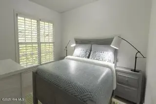 4930 N Hampton Drive SE, Southport, NC 28461 – photo 24: Virtually staged front bedroom