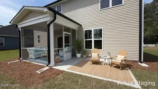 511 Country Club Villa Drive, Shallotte, NC 28470 – photo 21: Back porch + patio