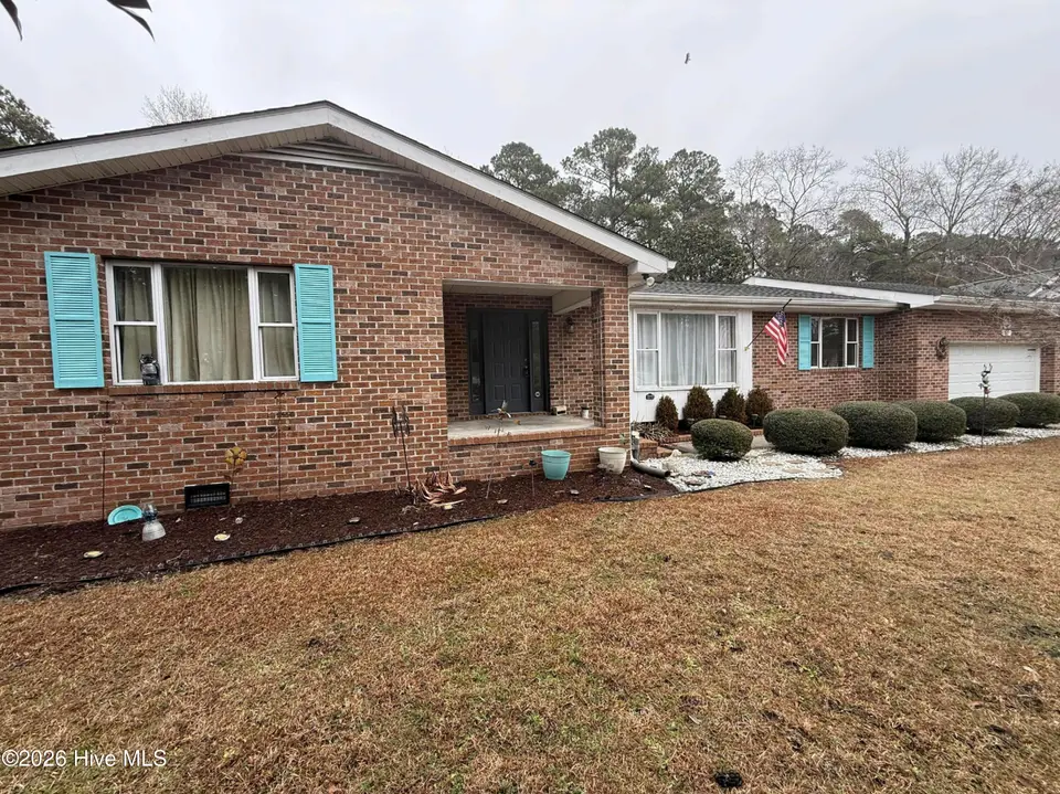 60 Country Club Drive, Shallotte, NC 28470 – photo 1 of 64: 60 cc front rev 1