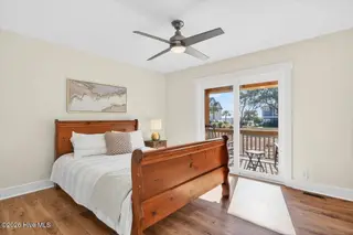 501 Shoreline Drive E, Sunset Beach, NC 28468 – photo 14: Primary Bedroom Suite