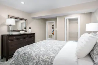 1303 Piper Glen Drive, Sunset Beach, NC 28468 – photo 12: Bed