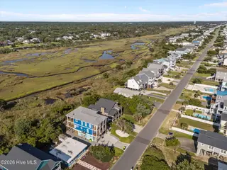 312 E Dolphin Drive, Oak Island, NC 28465 – photo 13: 14-web-or-mls-DJI_20250826171001_0129_D