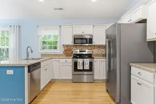 168 NE 3rd Street, Oak Island, NC 28465 – photo 15: 33-web-or-mls-dsc09786