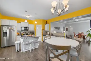 587 Meadowbrook Lane NW, Calabash, NC 28467 – photo 6: Kitchen Opens to Living